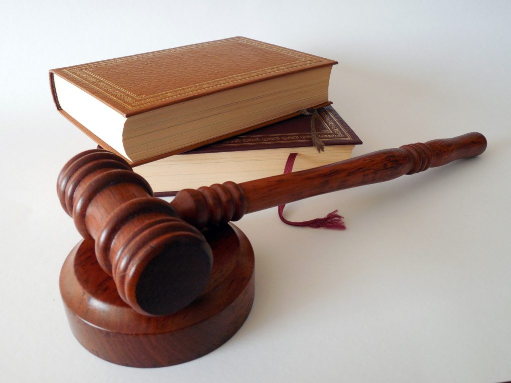 Photo of a gavel and law books.